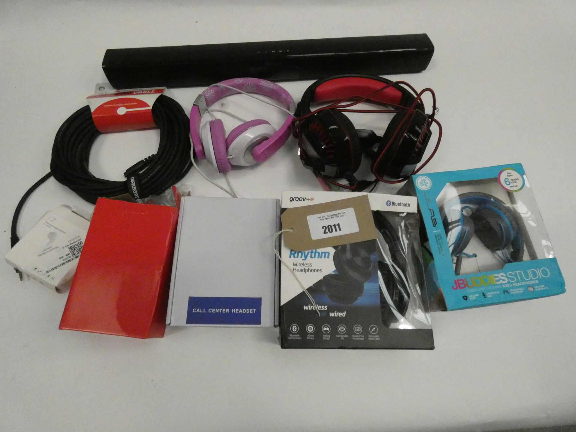 Bag containing various headphones/sets and soundbar