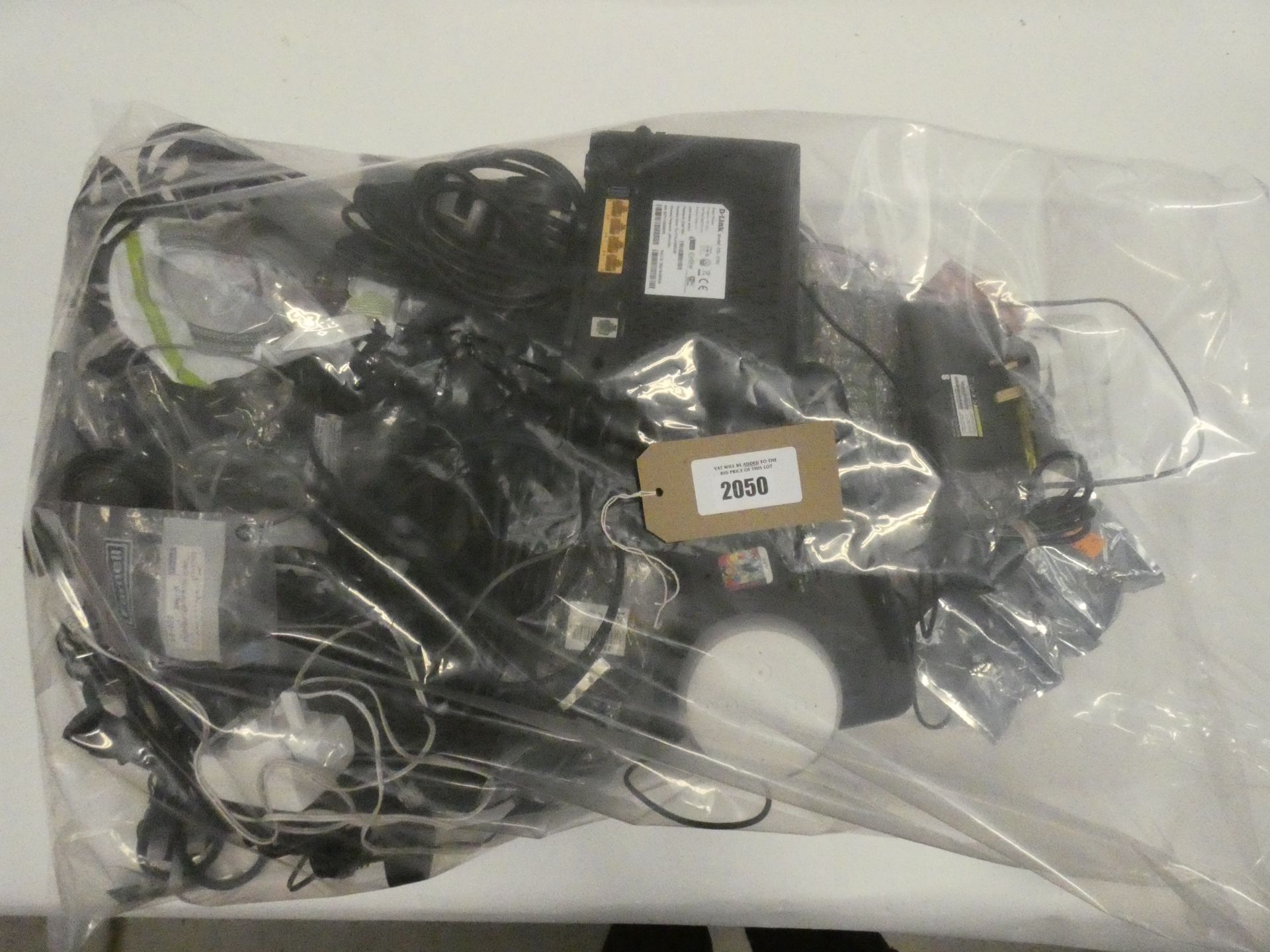 Bag containing mostly PSUs, leads, cables plus routers and other miscellaneous devices