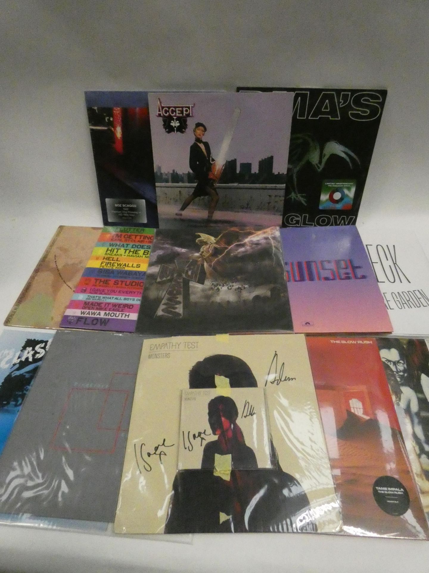 Box containing quantity of LP and 45 records to include The Clash, David Bowie, Tame Impala and