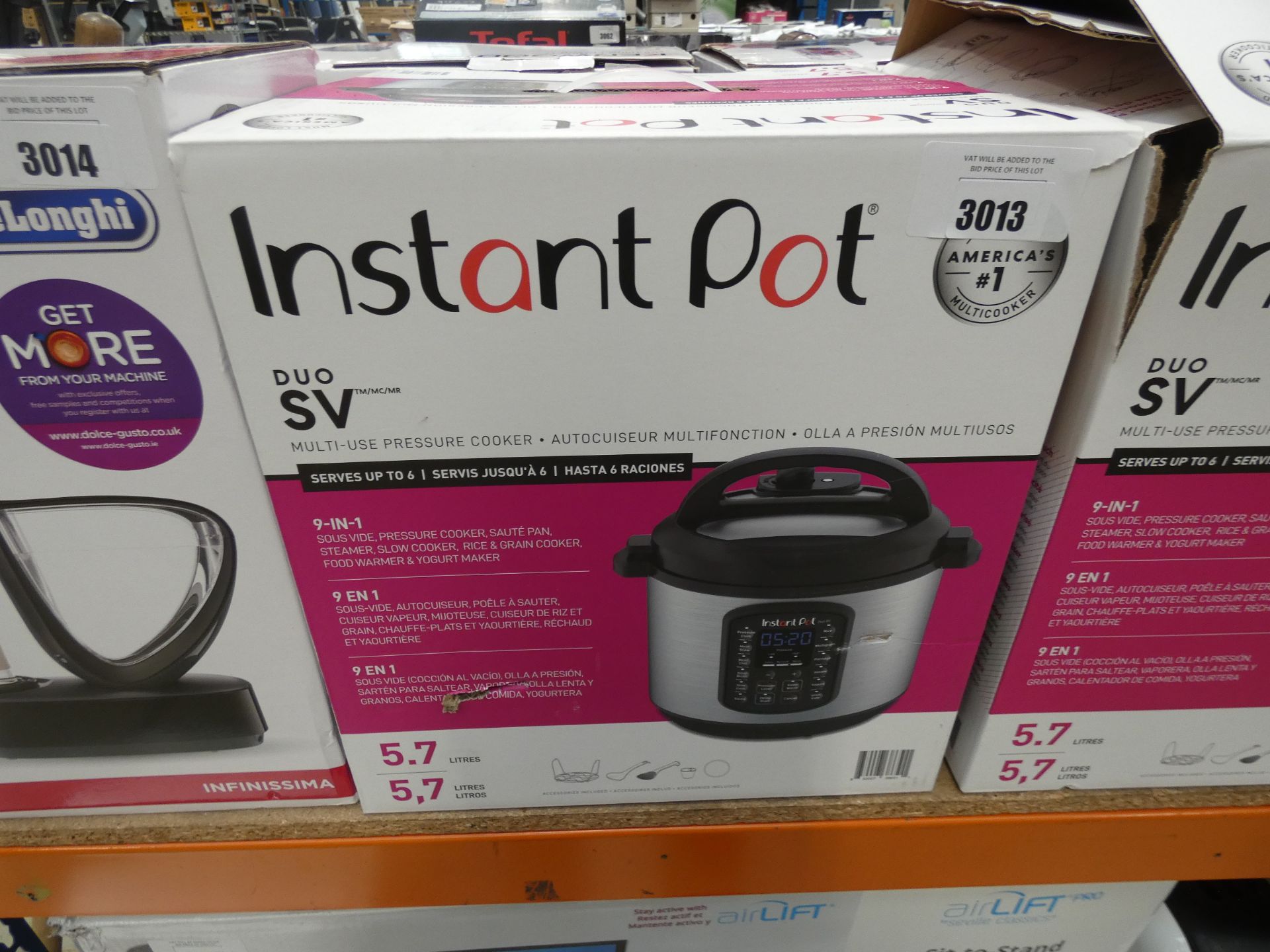 Boxed Instant Pot multi use pressure cooker