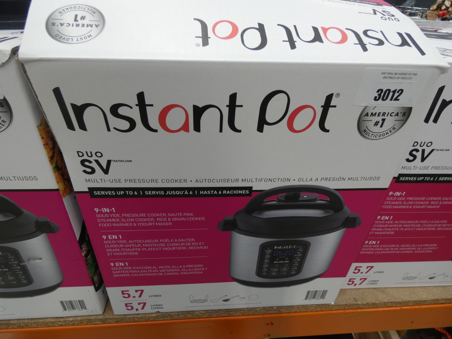 Boxed Instant Pot multi use pressure cooker