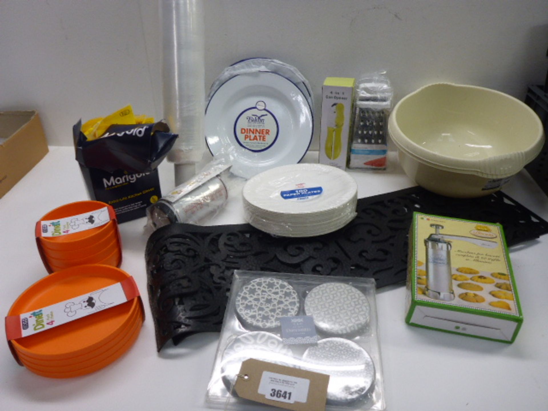 Non slip matting, cling film, metal, paper & plastic plates, washing up bowls, biscuit maker, can