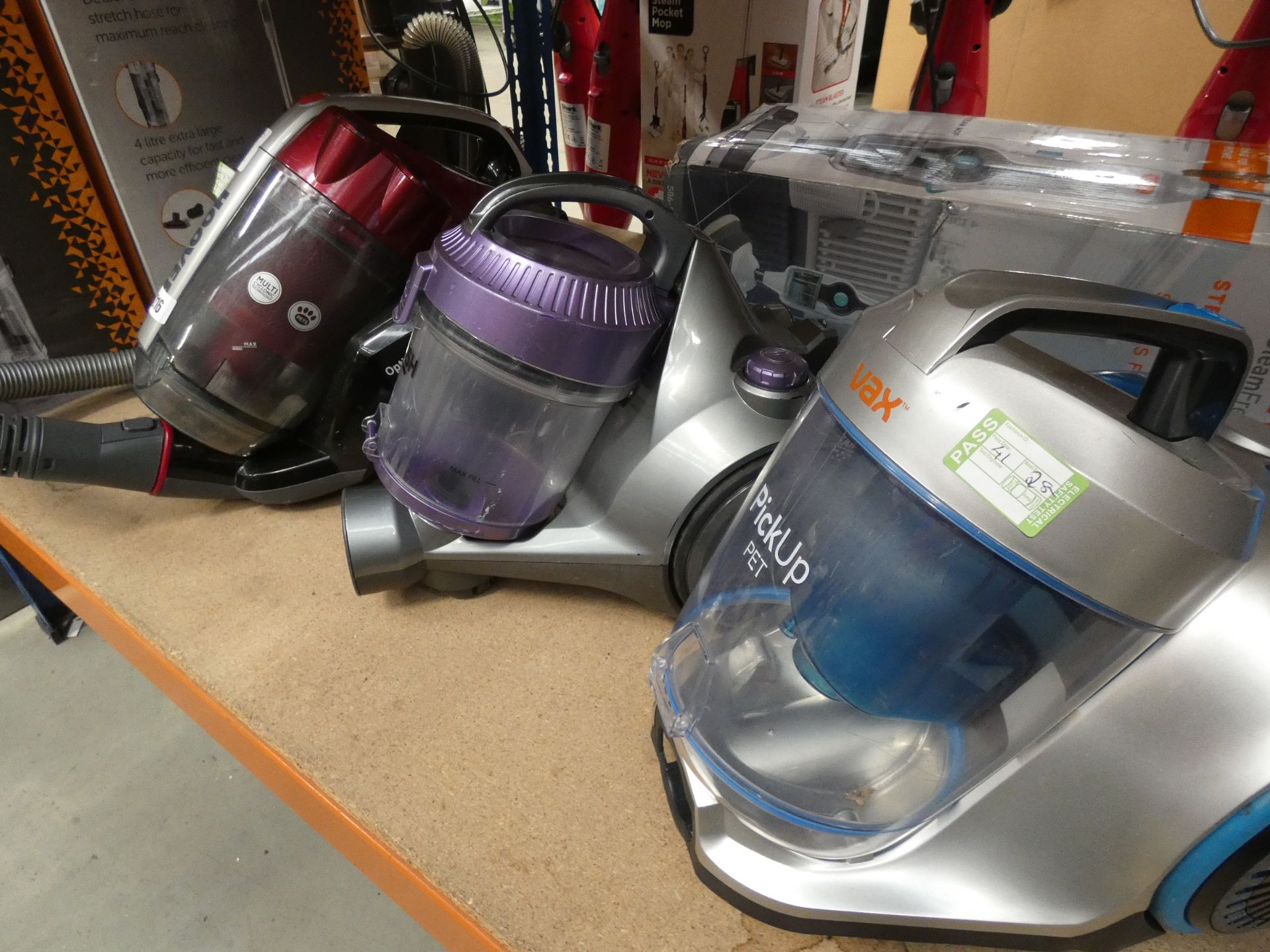 (26,27,28) 3 tug along vacuums: Hoover, Bush, Vax