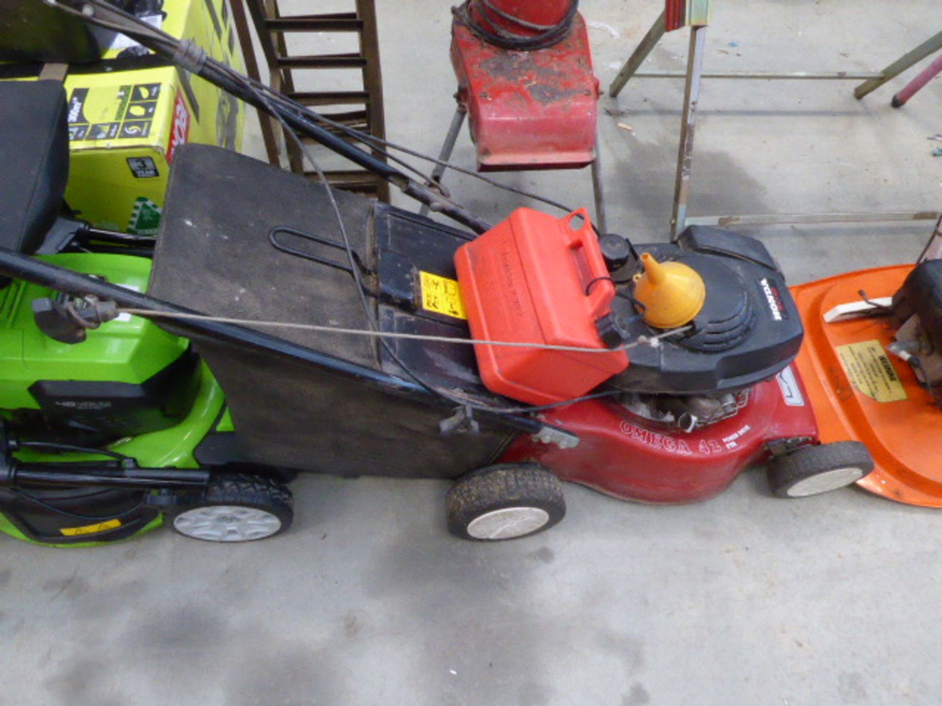 Honda powered Omega lawn mower with box