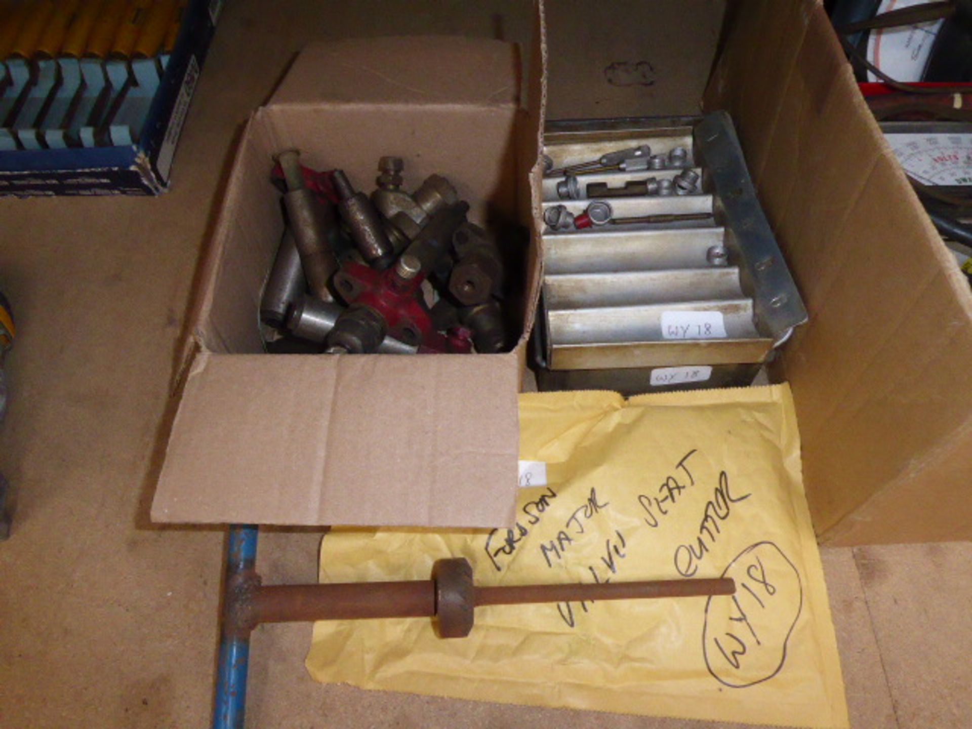 Mixed quantity of items to include machine parts, punches, taps and a Fordson Major valve seat