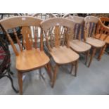 Four beech dining chairs