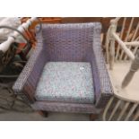 Lilac painted wicker armchair