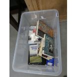Plastic box of various books