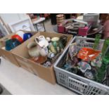 Three boxes containing coloured glass vases and dishes, a Hilsonia water jug, plus Devon pottery,