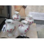(2040RR) 363 - A set of four Chinese armorial miniature vases of baluster form, each typically