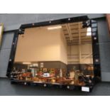 Tinted mirror in black frame