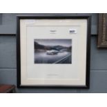 A photographic print of an Aston Martin car
