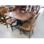 Large twin padded stool dining table with 8 matching cane seated chairs
