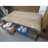Modern style coffee table with shelf under