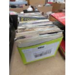 A box containing vinyl records