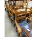 Pine dining table plus 8 chairs to include 2 carvers