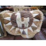 Alpaca circular rug on Alpaca skin
