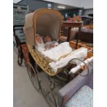 Vintage child's pram with 2 dolls