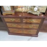 2 over 2 mahogany framed chest of drawers