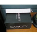 A boxed set of Sex and the City DVD's.