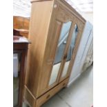 Lime washed double door wardrobe with drawer under