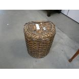 Wicker basket containing sewing items