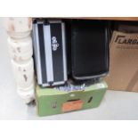 Box containing a BT briefcase plus camera cases