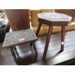 Two carved wooden stools