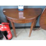 A Victorian mahogany demi-lune console table