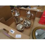 A silver plated tea service, plus cruet set and butter dish