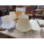 Pair of urn shaped table lamps, blue and white lamp, floral decorated lamp plus a pottery lamp