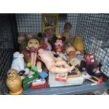 Cage containing a Russian doll and a quantity of childrens dolls