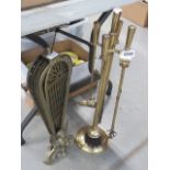 A brass fire companion set, plus a folding spark guard