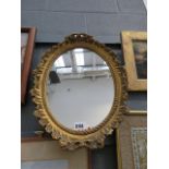 Small oval gilt framed mirror