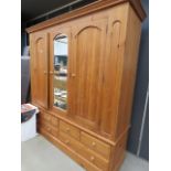 5284 - Pine triple wardrobe with drawers under