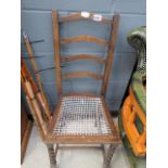 (5529) - An oak ladder back chair