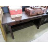 A dark wood dining table