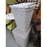 Two white painted wicker laundry baskets