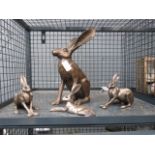 Cage containing 4 Frith sculpture resin rabbits