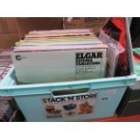 A box containing vinyl records