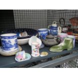 Cage containing blue and white cups and saucers plus bowls, tureen, ornamental boot, moustache mug