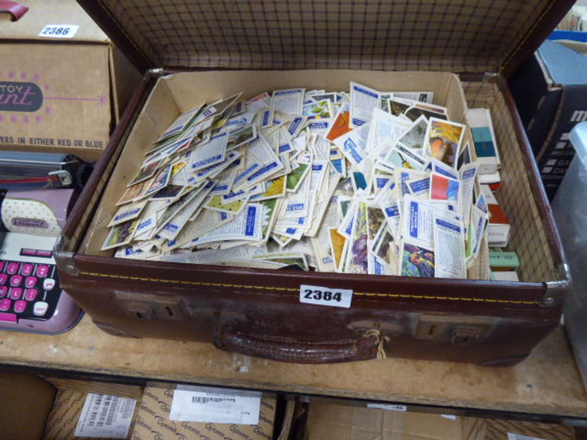 Suitcase containing wide variety loose collectors tea cards and cigarette cards