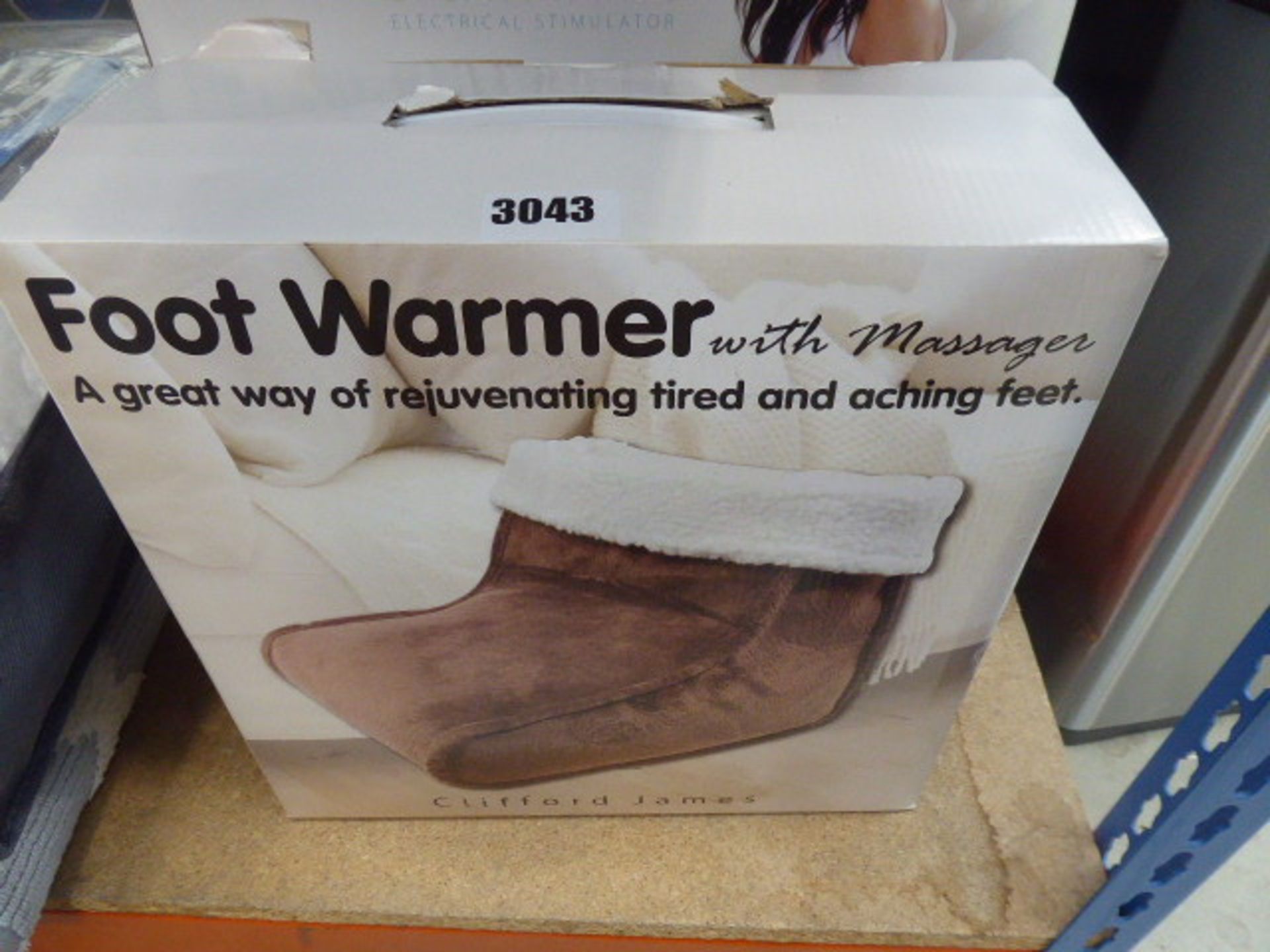 Boxed foot warmer plus circulation electrical stimulator