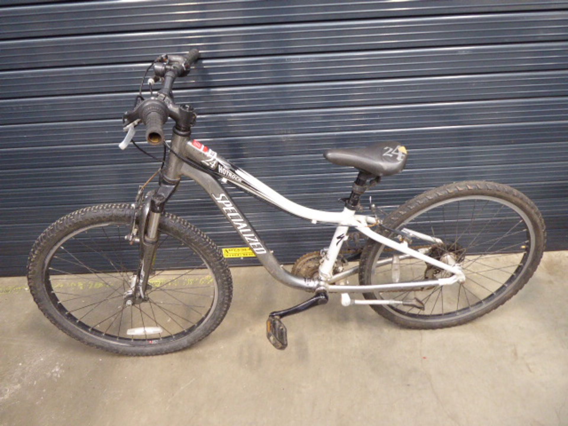 Grey specialised child's bike