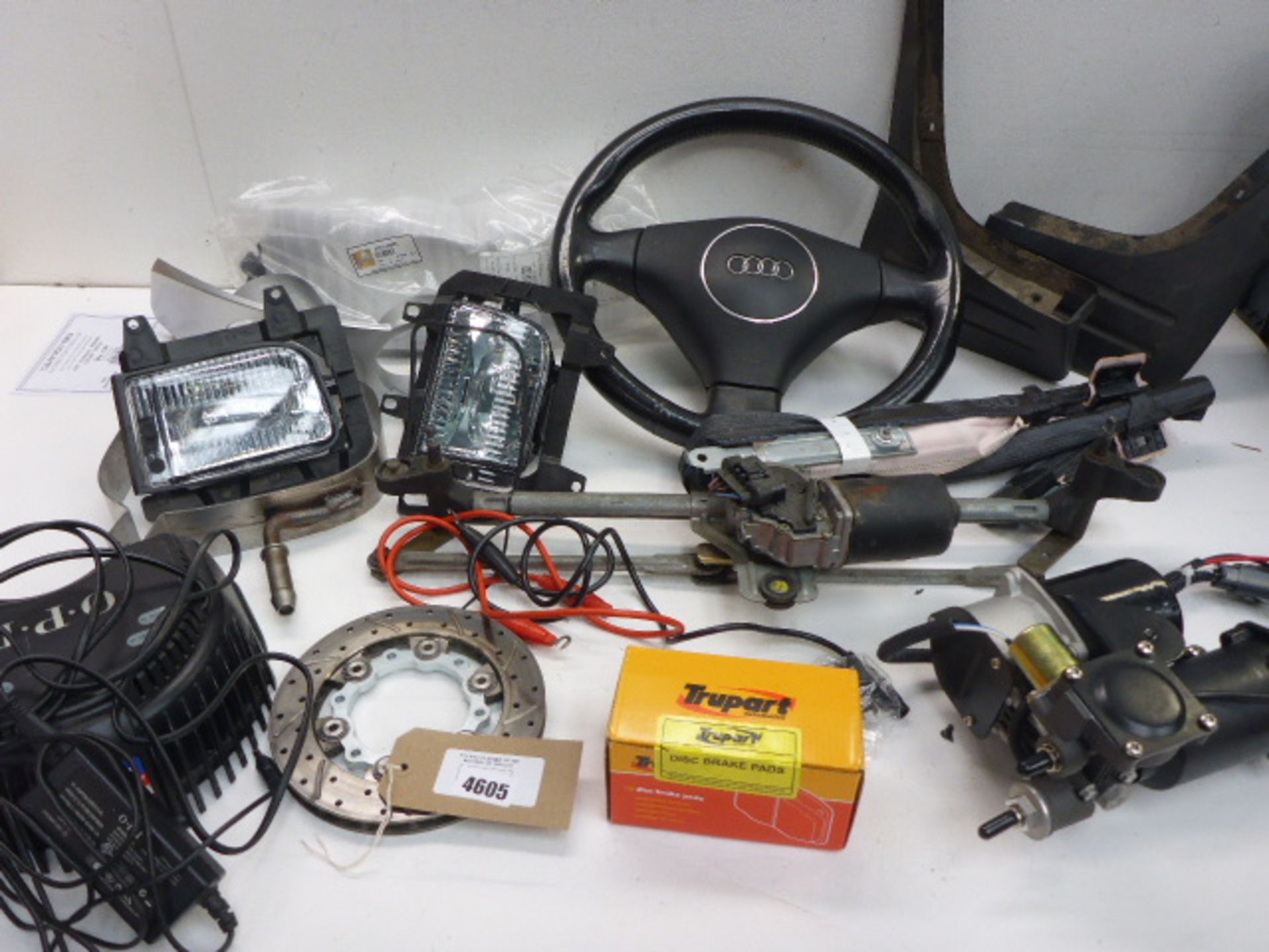 Audi steering wheel, mug flaps, spot lights, light housing, disc brake pads, engine parts etc