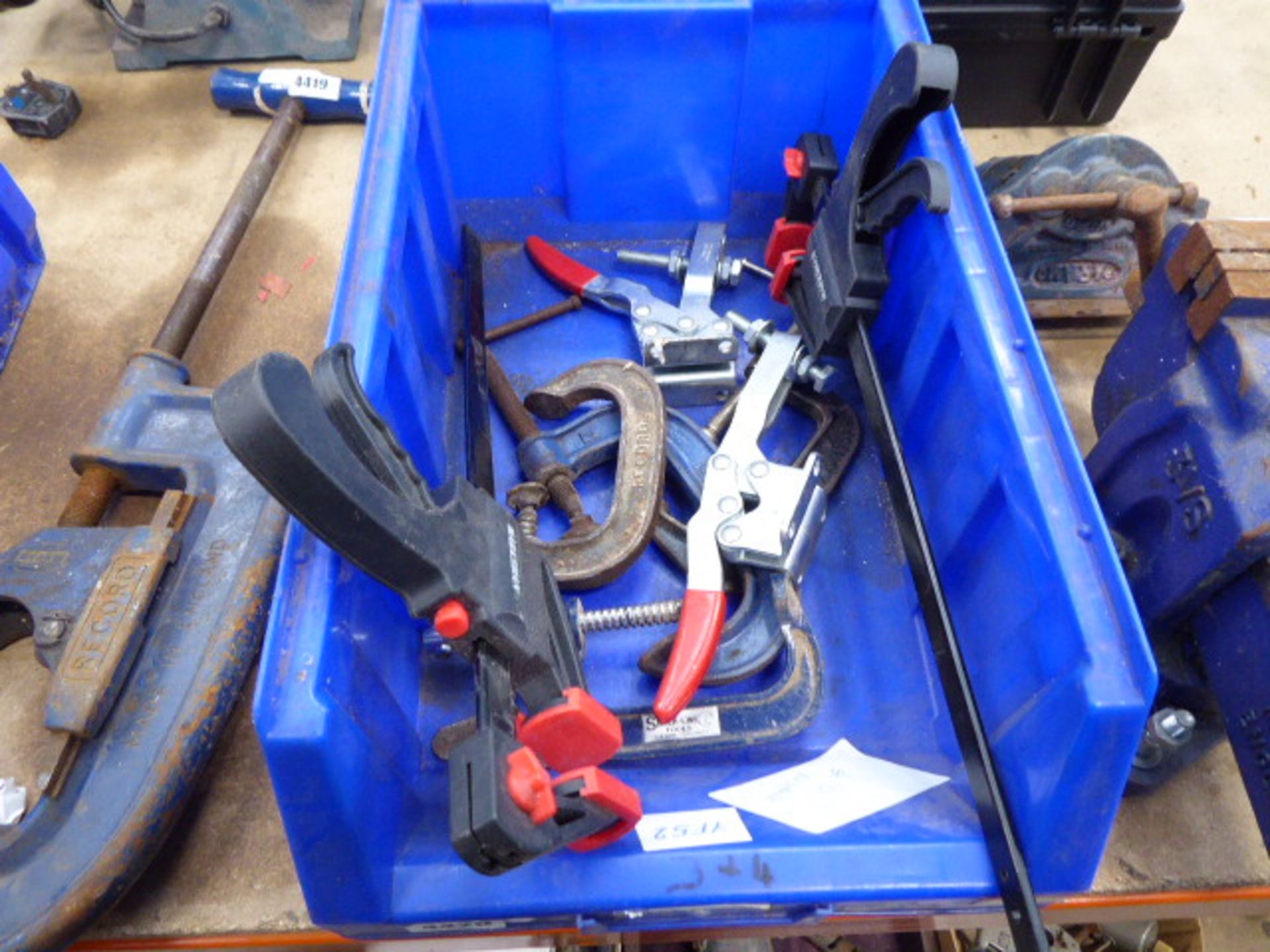 Blue box of assorted clamps