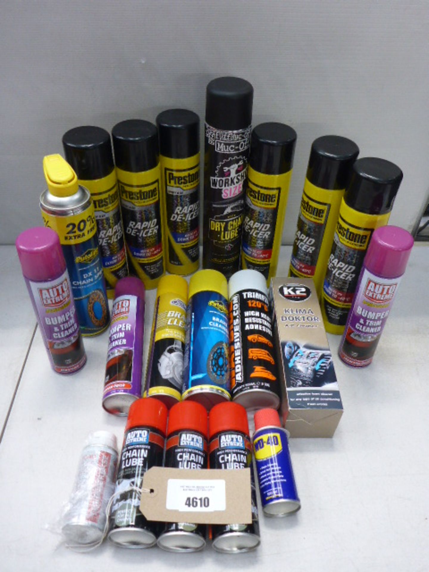Bag containing chain lube, bumper spray, high heat resistant adhesive, de-icer, air conditioning