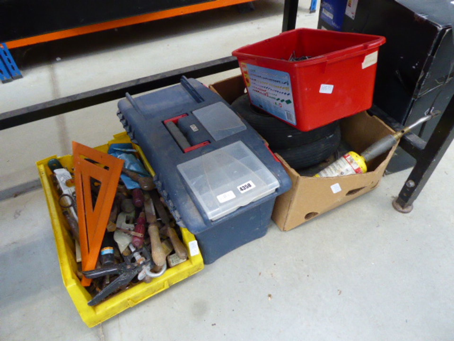 1/2 underbay of assorted tools, wheel barrow wheels, blow torch, files, nails etc