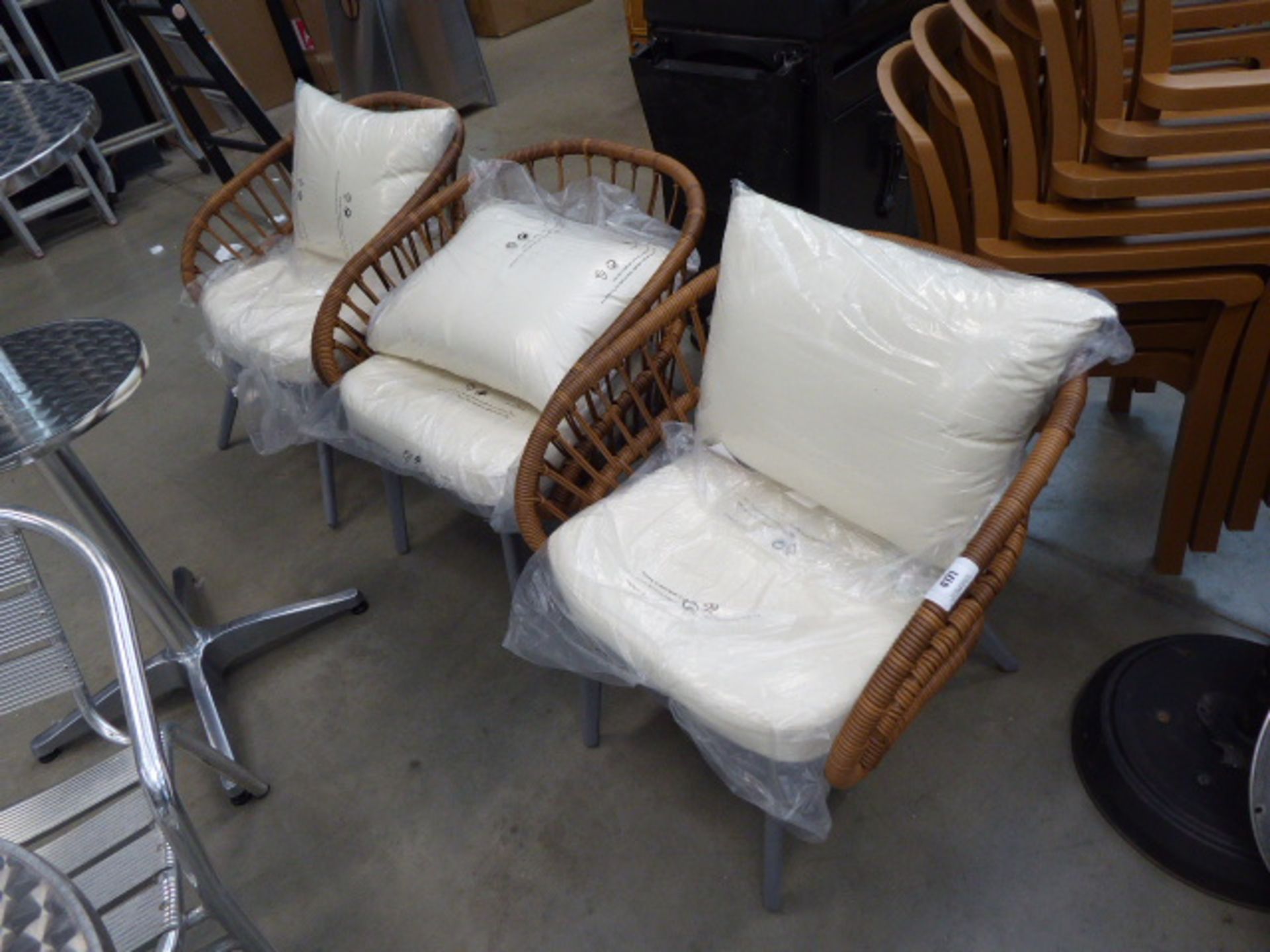 4171 3 Wicker style chairs with cream cushions