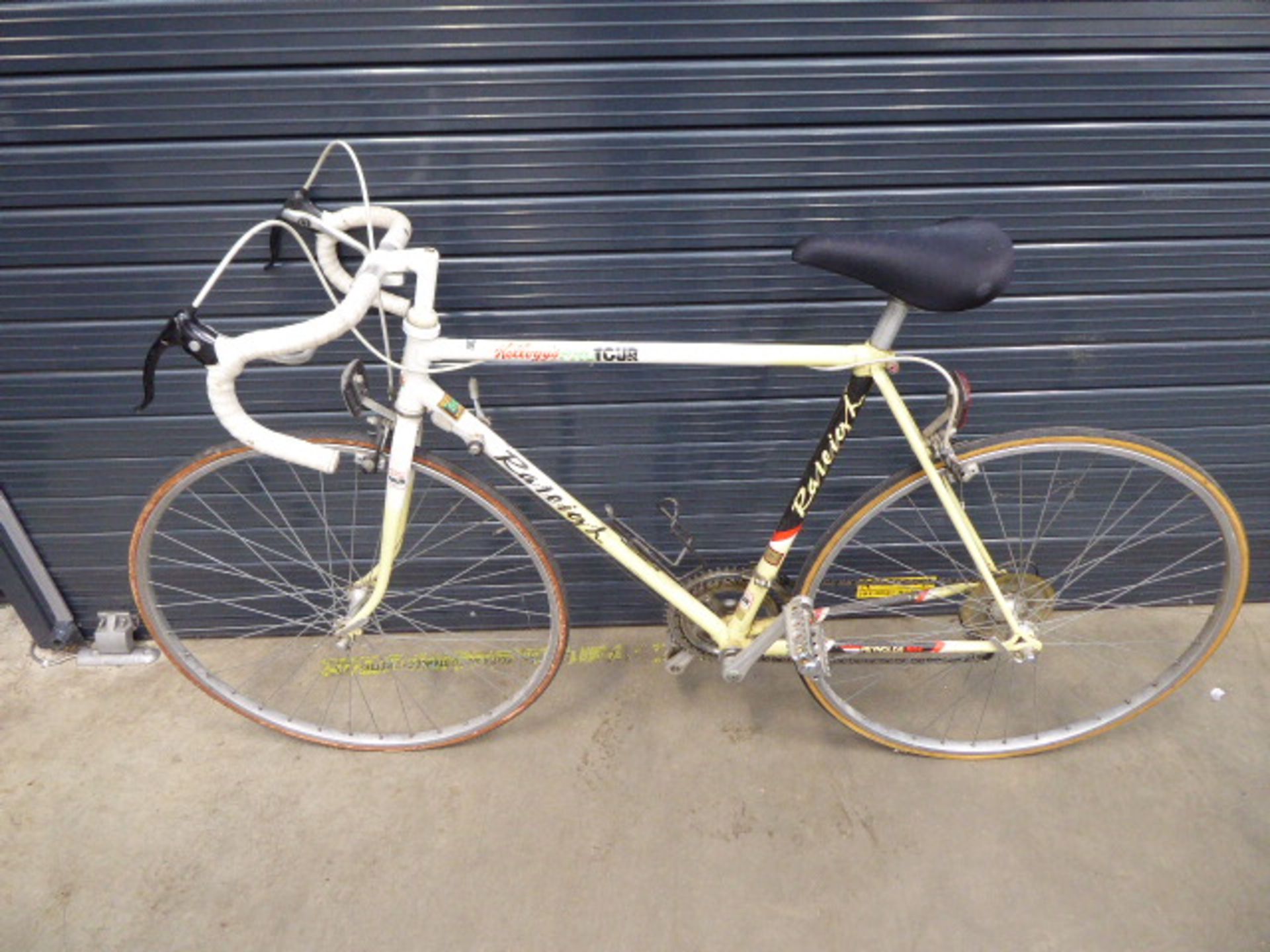 Raleigh yellow and white racing cycle